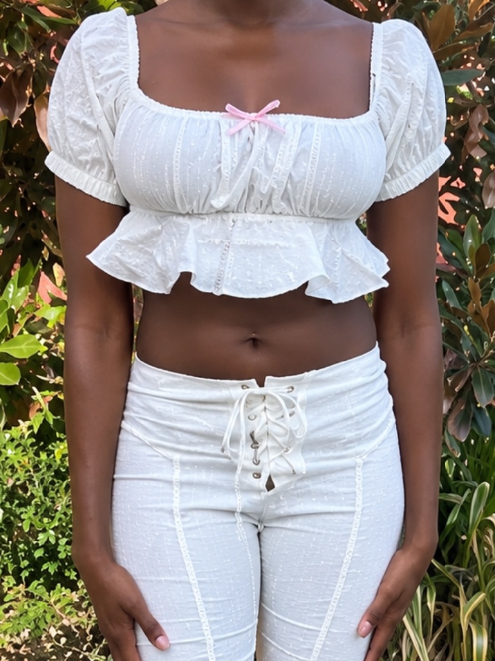 Serpenti White Puff Sleeve Peplum Crop Top with Pink Bow